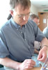 Sewing on the detail at Newton Aycliffe